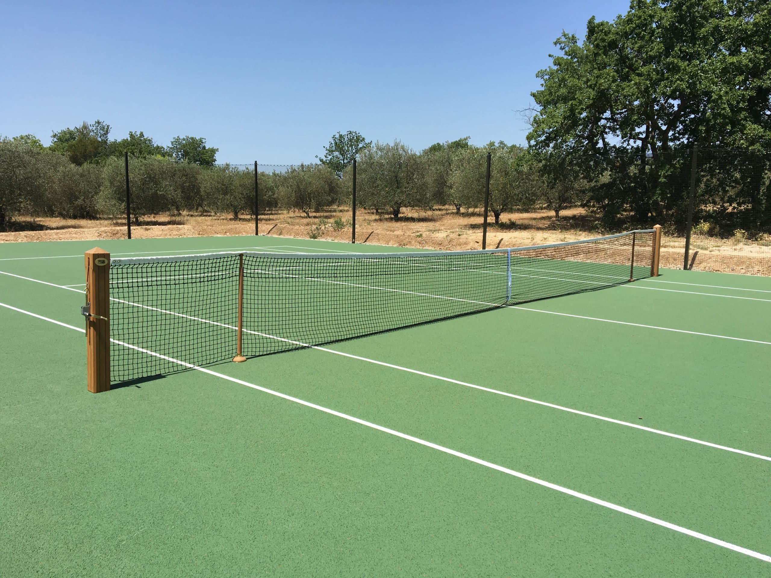 Construction terrain de tennis béton poreux